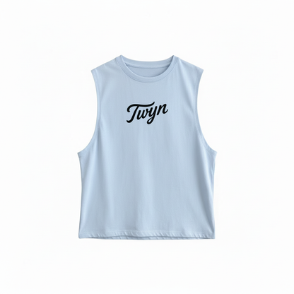 Light blue sleeveless organic cotton top with 'Twyn' branding on a white background