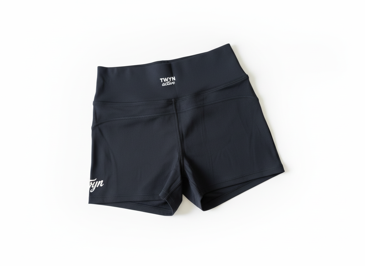 Black high-waisted bike shorts - back view
